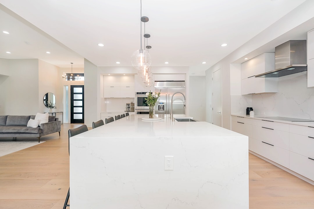 A countertop being inspected for repair in a Lakewood kitchen